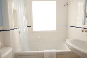 Perfect West Beach Location! Chapala Gardens Two-Level 1BR- Unit 3