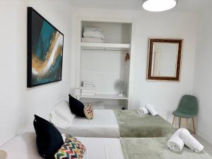 Postiguet Beach by United Renters