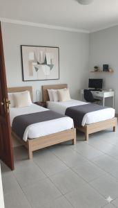 Suítes Privativas Confortáveis