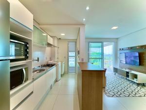 Apto em condomínio Pé na areia 3 Quartos Cozinha Completa Sacada com Churrasqueira Vaga de Garagem Piscina borda infinita Academia Quadra de esportes Sala de Jogos Summer Home Club acesso direto a praia