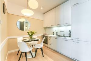 Apartament Calma - Basen Parking Fitnes Bawialnia w CENIE - Polanki Aqua - Holiday City