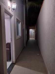 Casa térrea 2 dormitórios, Wi-Fi, churrasqueira e garagem