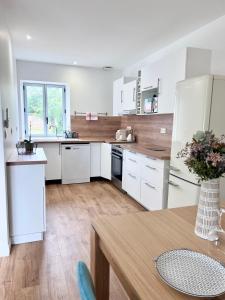 Maison avec grand jardin en centre ville