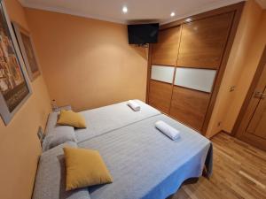 Bouzas. Garaje con cargador V.E.