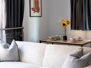 Modern riverside apartment Pass The Keys