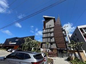 Flat beira-mar pé na areia com varanda