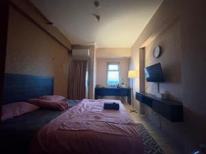 Apartemen Gunung Putri by Maknyoss Rooms