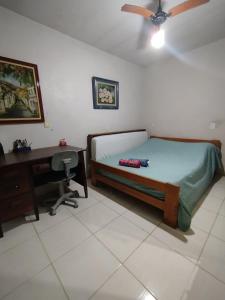 casa na Reserva Nacional do Surf com trilha na rua e entrada compartilhada