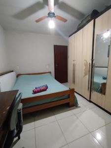 casa na Reserva Nacional do Surf com trilha na rua e entrada compartilhada