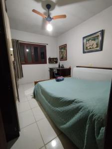 casa na Reserva Nacional do Surf com trilha na rua e entrada compartilhada