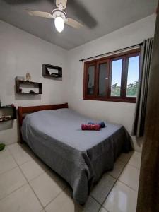 casa na Reserva Nacional do Surf com trilha na rua e entrada compartilhada