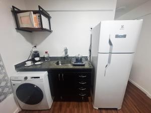 Studio tipuana, varandinha aberta com rede