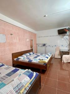 Nhà Nghỉ Quỳnh Hương - Quynh Huong Hostel