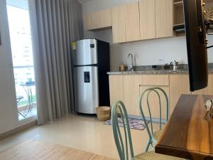 Coastal apartment with pool access and viewpoint