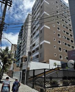 apto frente praia pé na areia 2dorm wifi elevador Smart tv praia grande aviação - leia fotos