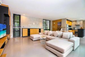 Nature-Inspired 2BR Duplex P12 with pool and gym