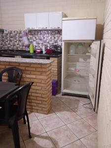 Casa Hum com cozinha americana