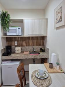 Apart 329 Porto Marina Mont Blanc Refúgio aconchegante com vista privilegiada para a serra, dentro do Hotel