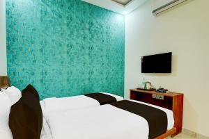 Super Hotel O Western Pride Hotel Bangalore Premier Taxi Services - OJO TAXI