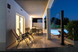 Villa ELLA ESTELLE with a heated pool, hot tub, sauna