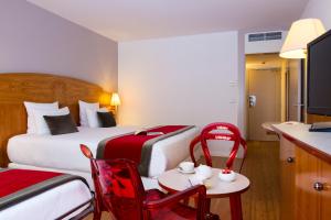 Hotels HOTEL C SUITES chambres spacieuses : photos des chambres