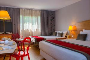 Hotels HOTEL C SUITES chambres spacieuses : Suite Junior (4 Adultes)