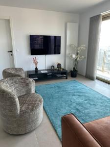 Spacious and modern apartment with open sea view