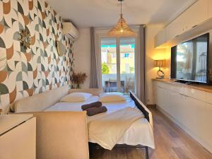 Les Lavandes - à 5min de la mer à pieds , avec balcon et parking - BY AURAconciergerie