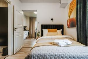 Guestly Homes - Modern & Central 1BR