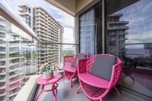 Dominiks pink dream Studio Balcony Ocean View Balcony Fast-Wifi at Tambuli Resort High Floor