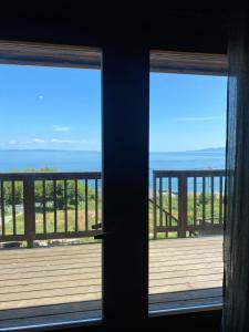 海を眺めるログハウス カマカーマAwaji