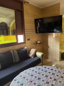 Maison familiale 2 chambres salon marocain