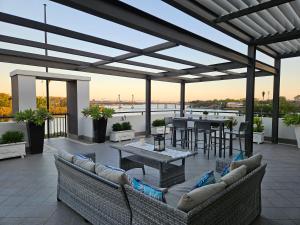 Breathtaking Waterfront Penthouse with BigTerrace near to Olympic Park