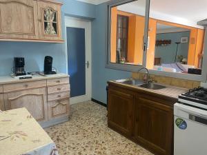 Maison confortable avec grand jardin