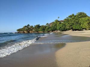 1BR Suite at Villa Costa Verde near Playa Cofresi, Puerto Plata, with a pool, balcony and a rooftop terrace