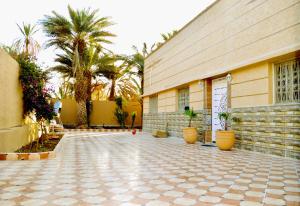 Villa Palm Star - A Peaceful Retreat with AC, WiFi & Private Parking , Arfoud