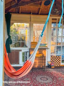 Winterharde pipowagen met hottub, bbq & uitzicht