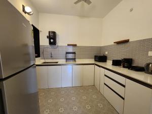 Candolim 1BHK Vacation Rental with Pool Balcony Parking and WiFi