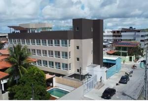 Studio c piscina rooftop pertinho da praia - S109