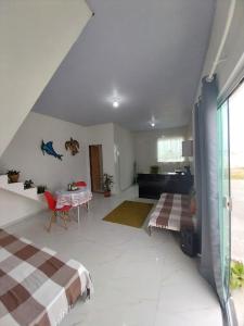 Estudio pe na areia em Monte Alto