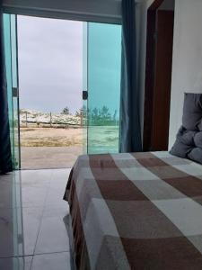 Estudio pe na areia em Monte Alto