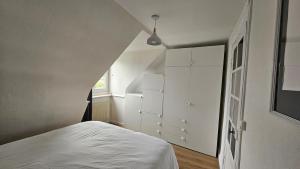Appartement lumineux - 2 chambres - jardin