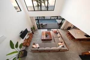 Private Beachfront 4 BR Home w Dock, Pool, Rooftop