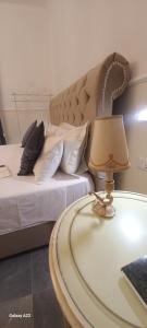 PALAZZO NOVECENTO Centro Storico Rooms & Wellness