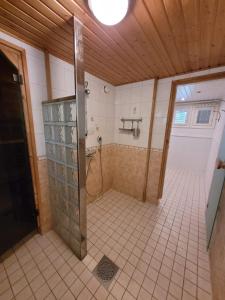 Saunallista omakotitalomajoitusta Kuusamon keskustan tuntumassa