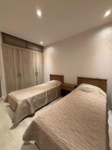 Appartement moderne avec vue mer & piscine, Dar Bouazza