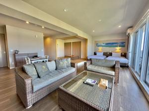 Coral Palace Onna by Sunset Avenue