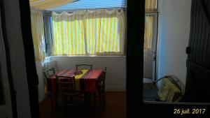 Grand studio avec Véranda à 250m de la plage