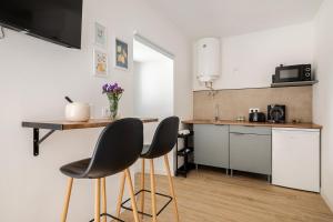 Tiny house with sunset over the ocean