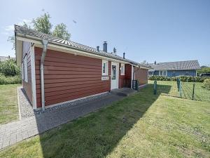 Matilda 32 - Holz-Ferienhaus mit Sauna, Kamin und Garten